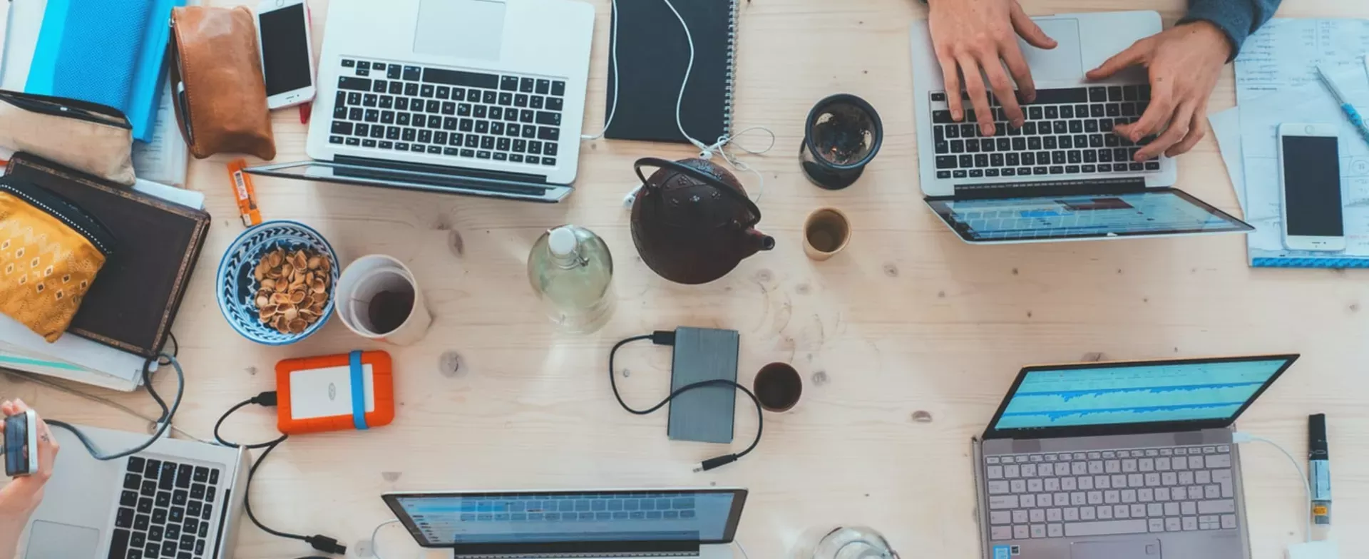 Top view of team working with laptops